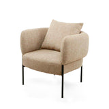 Sillón tapizado con cojín y base de metal.