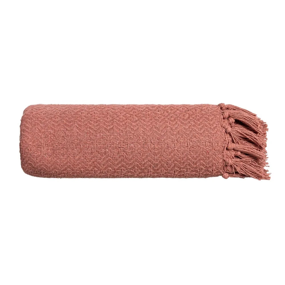 Decorative blanket in pink terracotta.